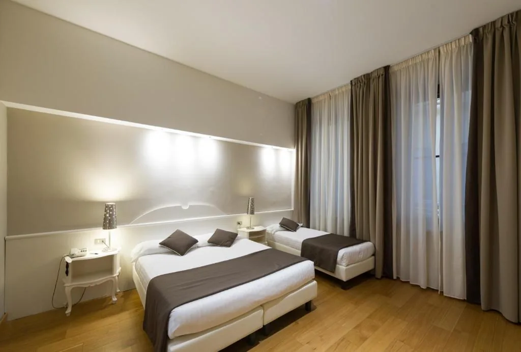 Quadruple Room — Hotel Cosimo de’ Medici
