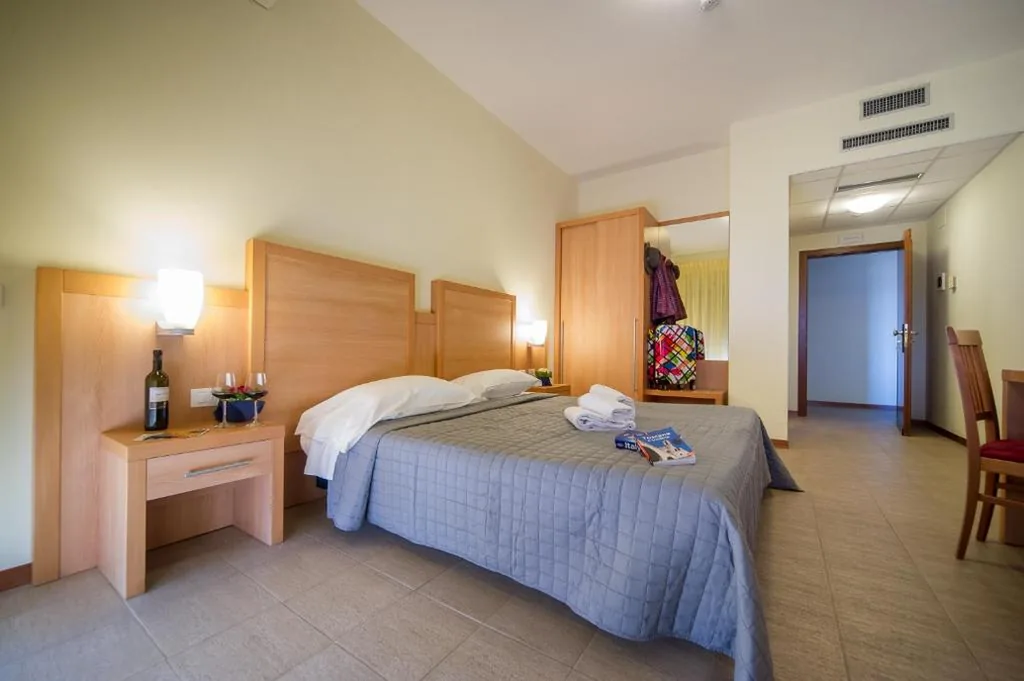 Quadruple Room — Hotel Foresteria