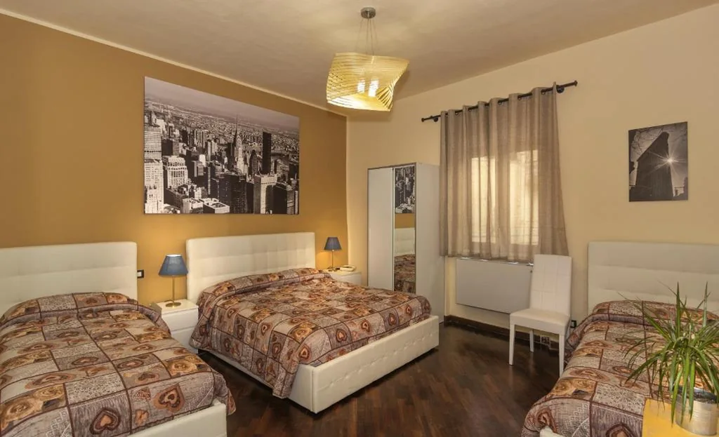 Quadruple Room — Hotel Il Giardino