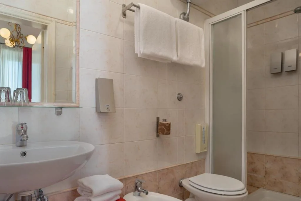 Quadruple Room — Hotel Kursaal & Ausonia