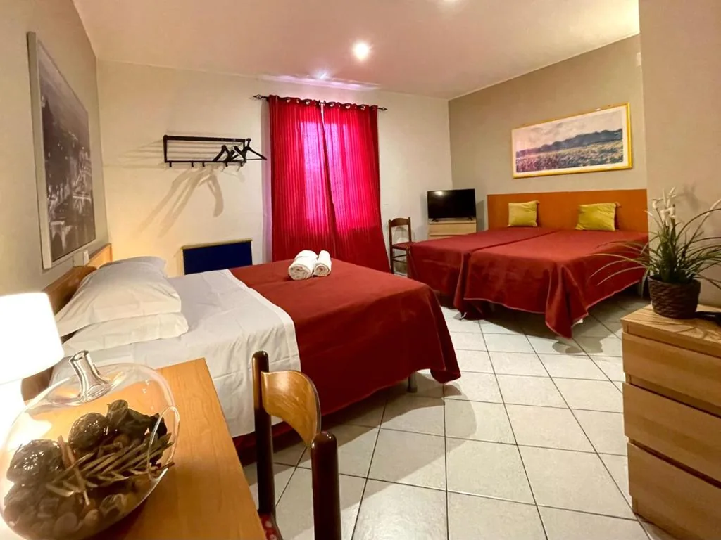 Camera Quadrupla — Hotel Leopolda