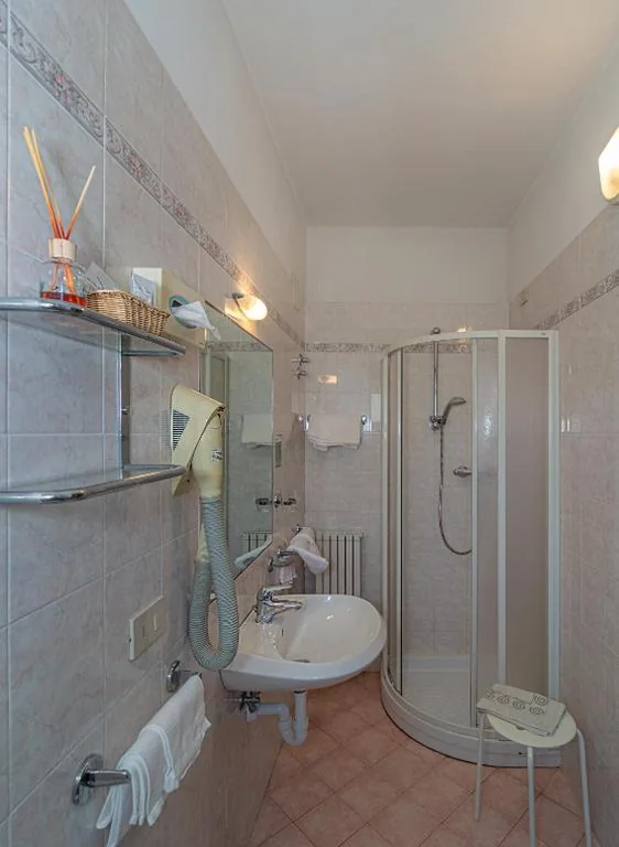 Quadruple Room — Hotel Mariani