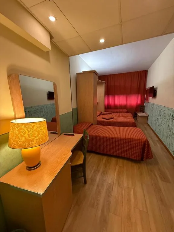Quadruple Room — Hotel Meridiana
