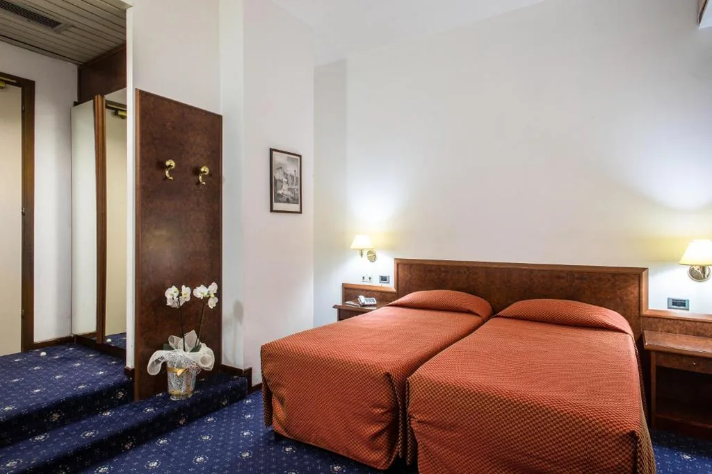 Quadruple Room — Hotel Mirage