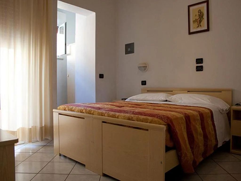 Camera Quadrupla — Hotel Monica