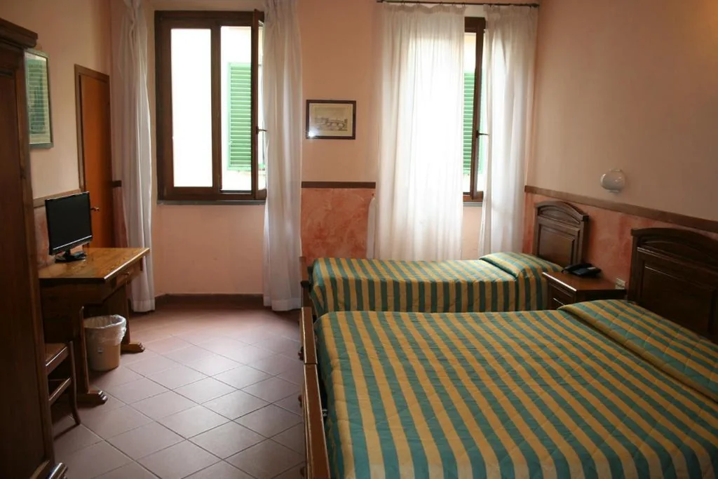 Quadruple Room — Hotel Monica