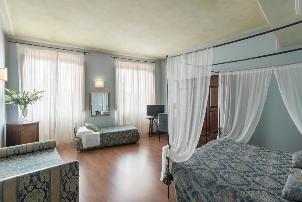 Quadruple Room — Hotel Palazzo dal Borgo