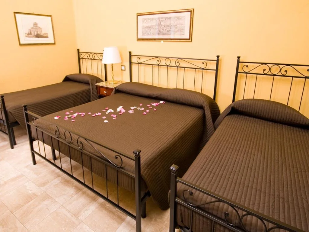Quadruple Room — Hotel Pisa Tower