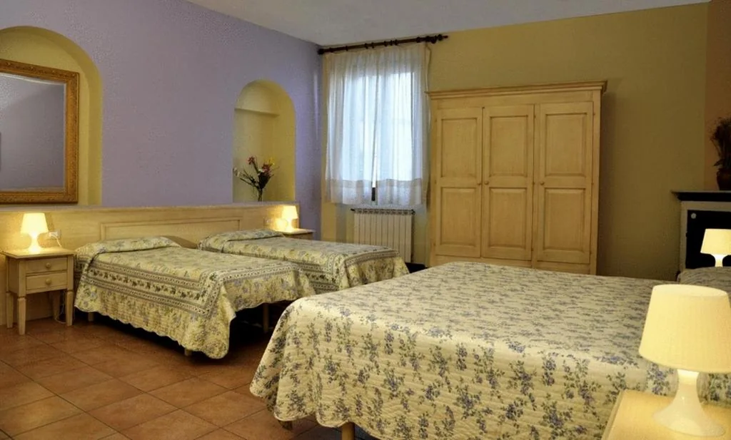 Quadruple Room — Hotel Regina