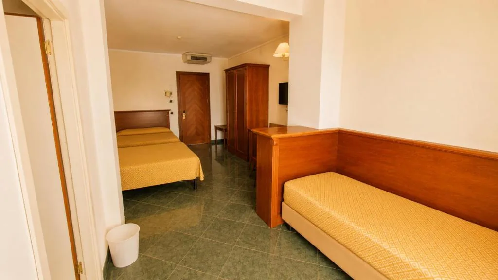 Quadruple Room — Hotel Residence Villa Marzia