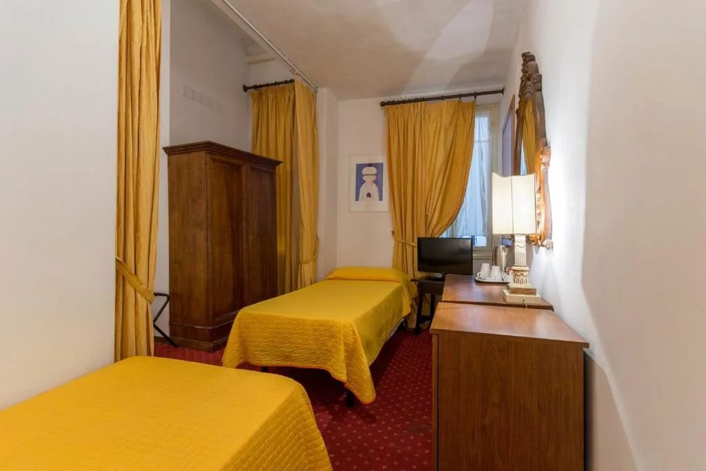 Quadruple Room — Hotel Rex