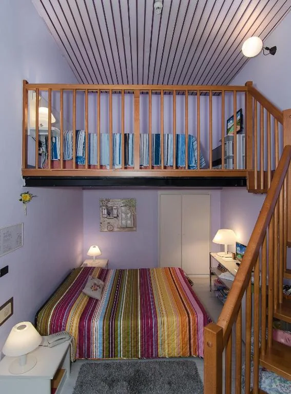 Quadruple Room — Hotel Rex