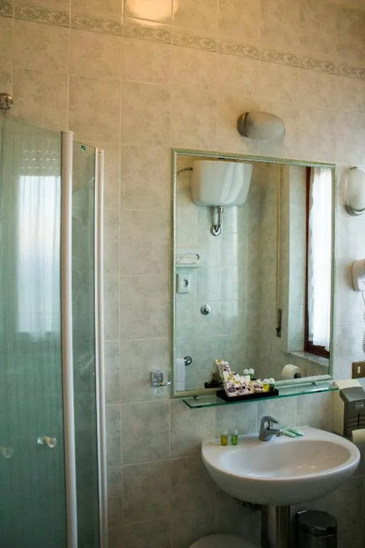 Quadruple Room — Hotel Ristorante Tre Stelle