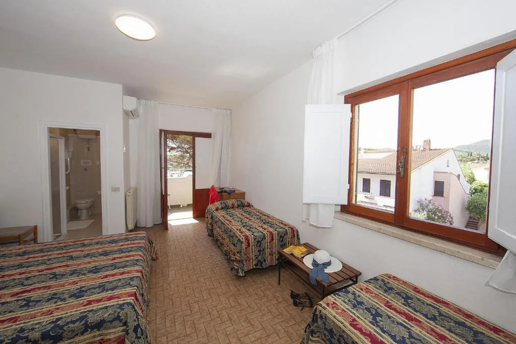 Quadruple Room — Hotel Santa Caterina