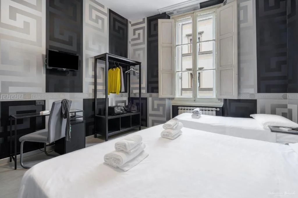 Quadruple Room — Hotel Spagna