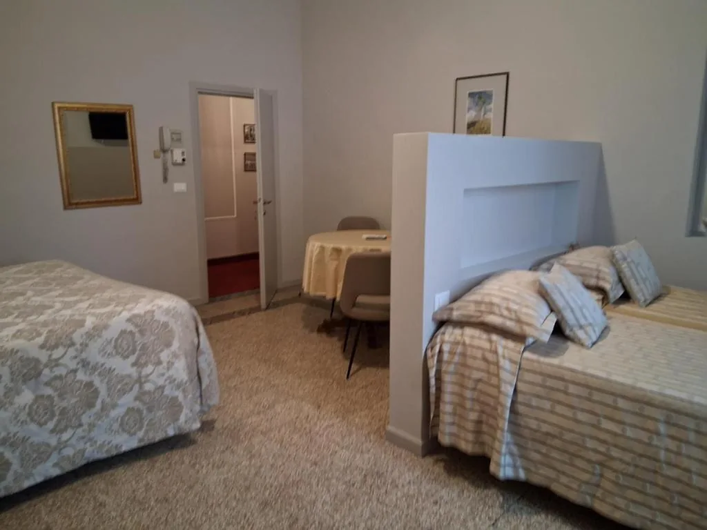 Camera Quadrupla — Hotel Tourist House