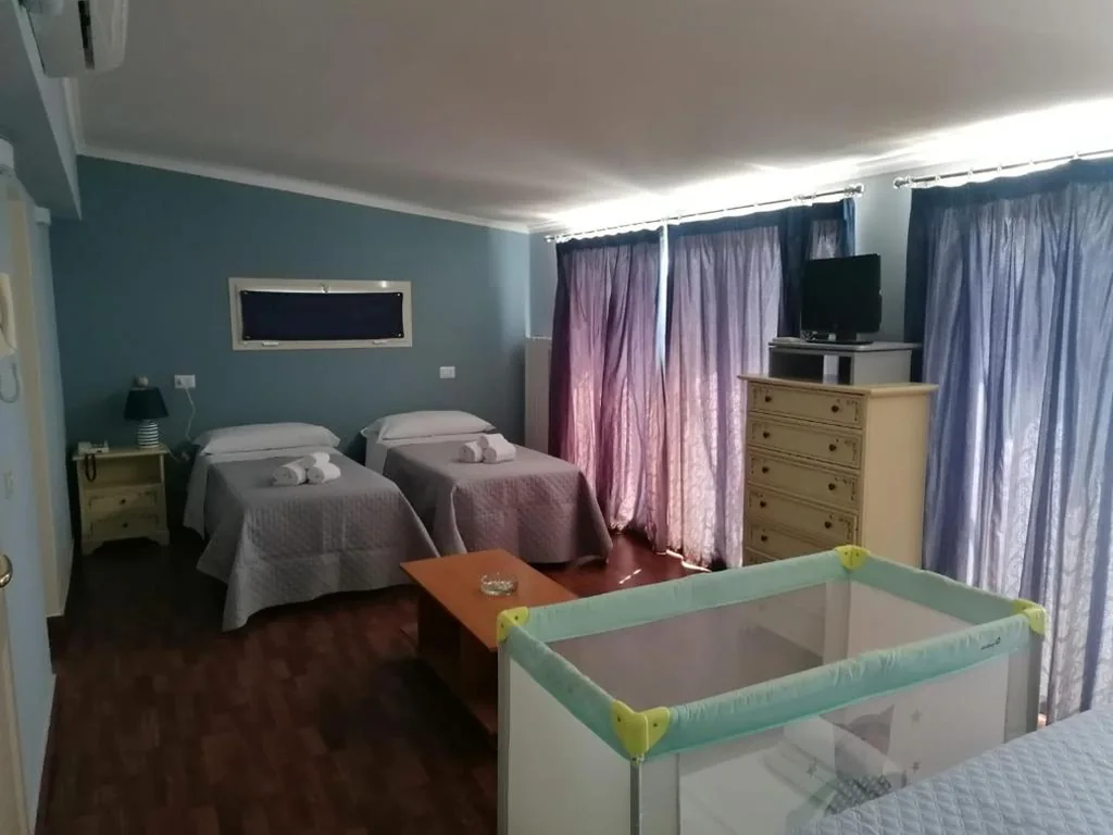 Quadruple Room — Hotel Villa Benvenuti