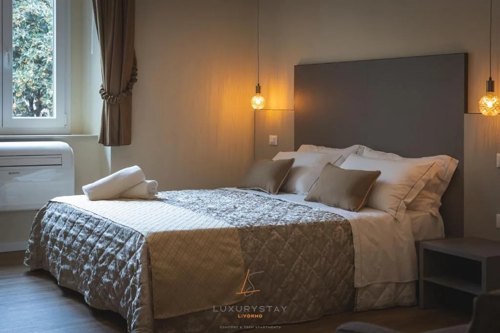 Camera Quadrupla Luxury — LivornoLuxuryStay