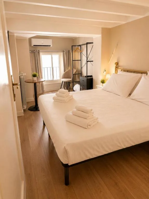 Standard Quadruple Room — Boboli Living