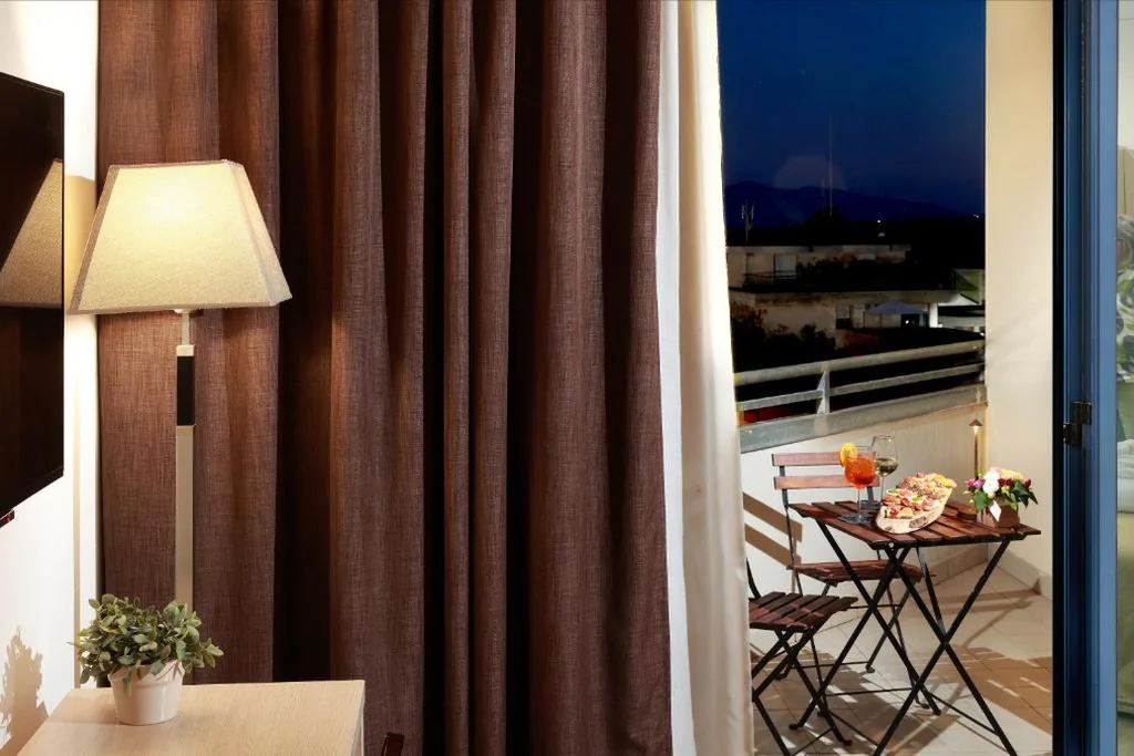 Camera Quadrupla Standard con Balcone — Tuscany Inn