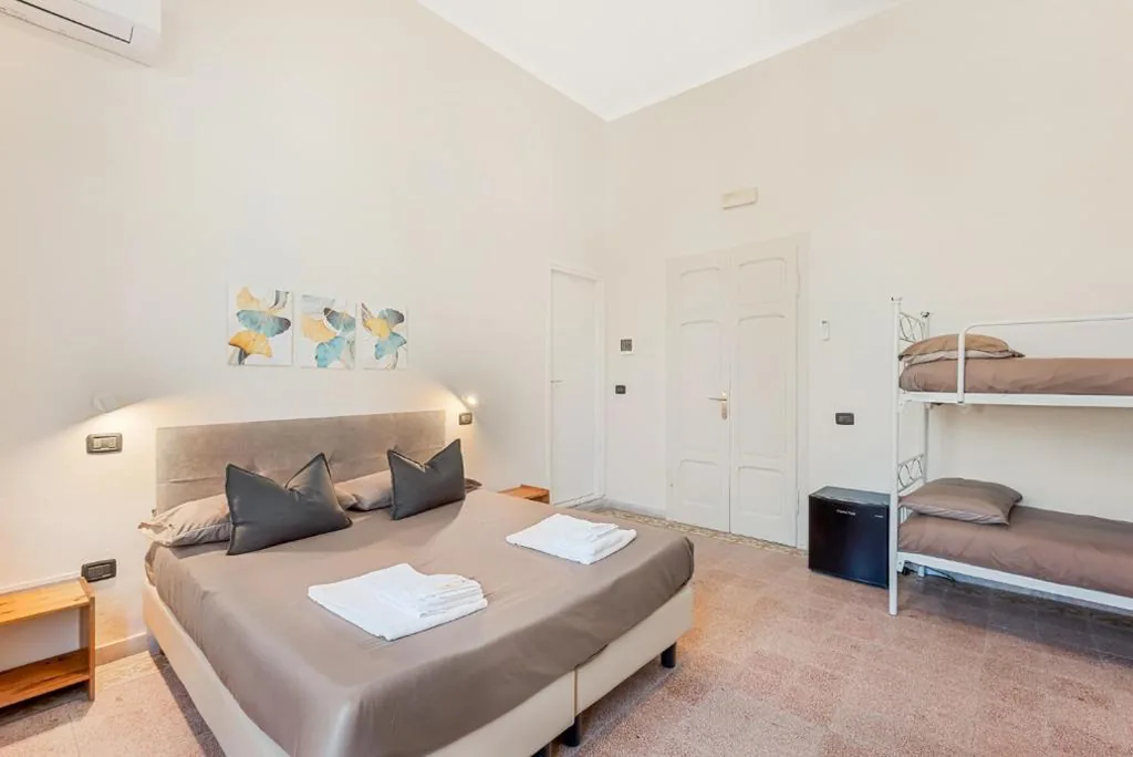 Standard Quadruple Room — Hotel La Perla
