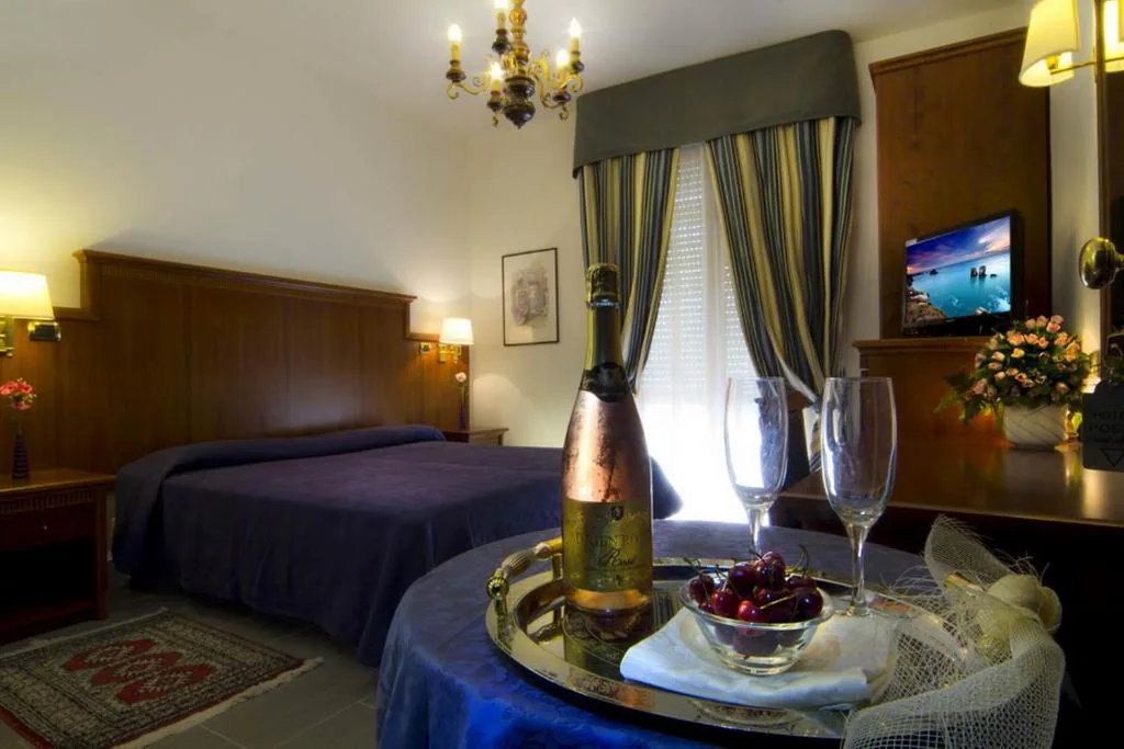 Camera Quadrupla Standard — Hotel Posta