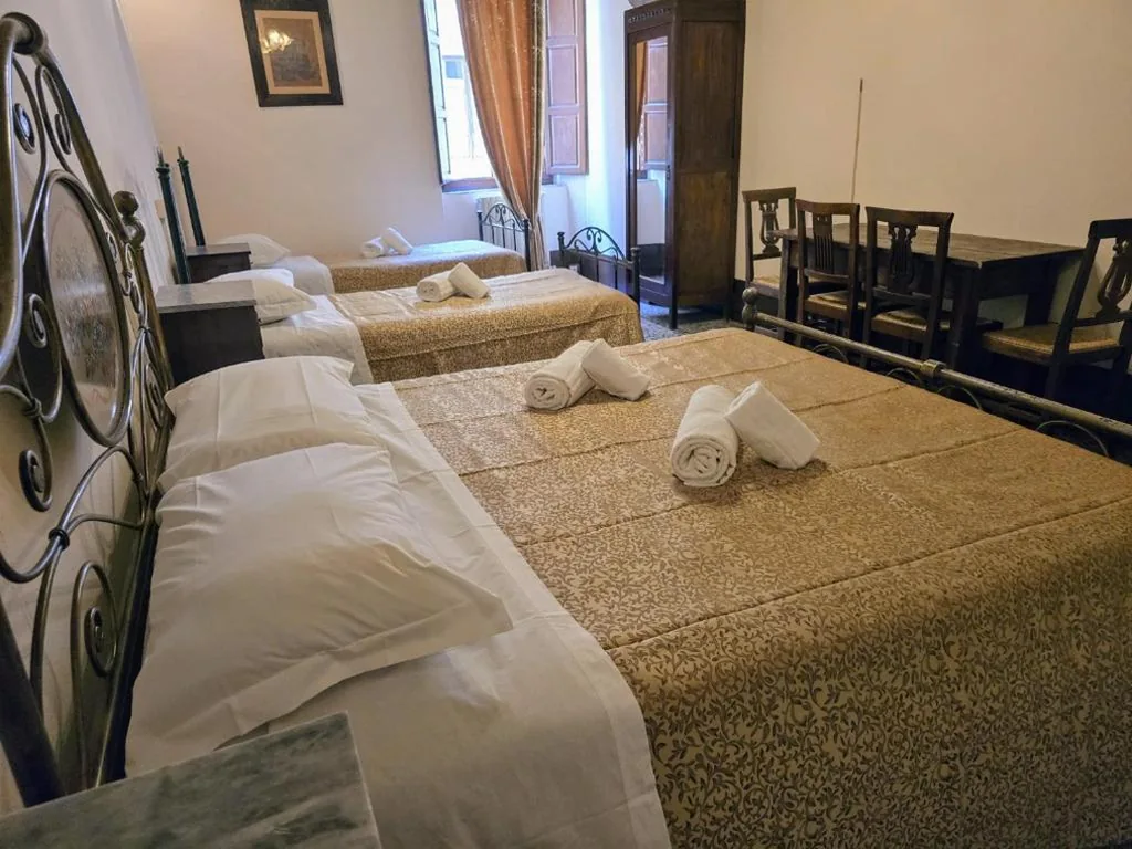 Quadruple Room — Stay in the heart of Pisa at Dietro al Corso