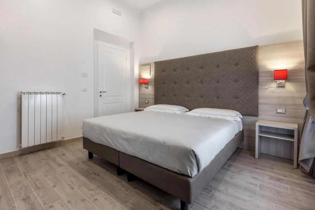 Superior Quadruple Room — Apollo Guest House