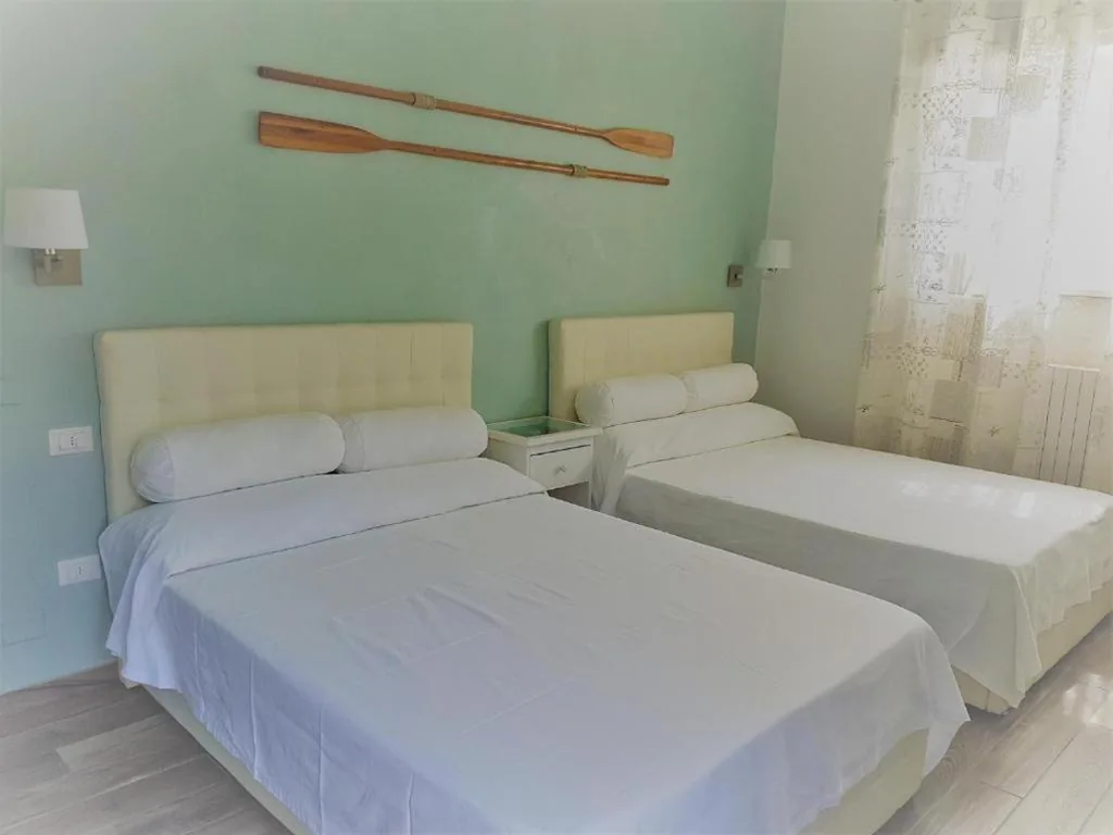 Camera Quadrupla Superior — Bedrooms Venezia – camere e spiaggia