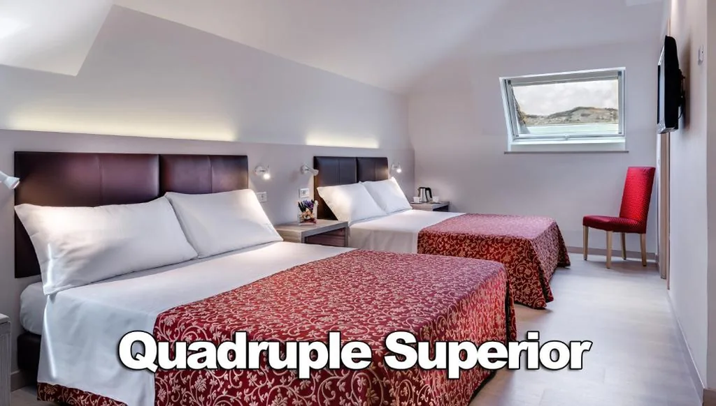 Superior Quadruple Room — Hotel Boston