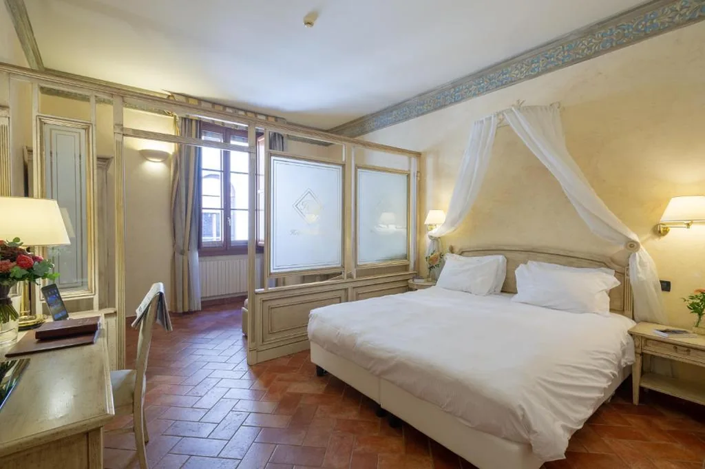Superior Quadruple Room — Hotel Davanzati