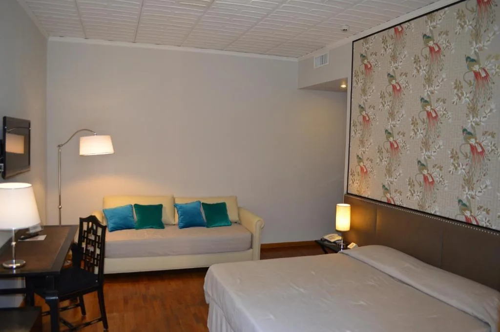 Camera Quadrupla Superior — Hotel Giglio