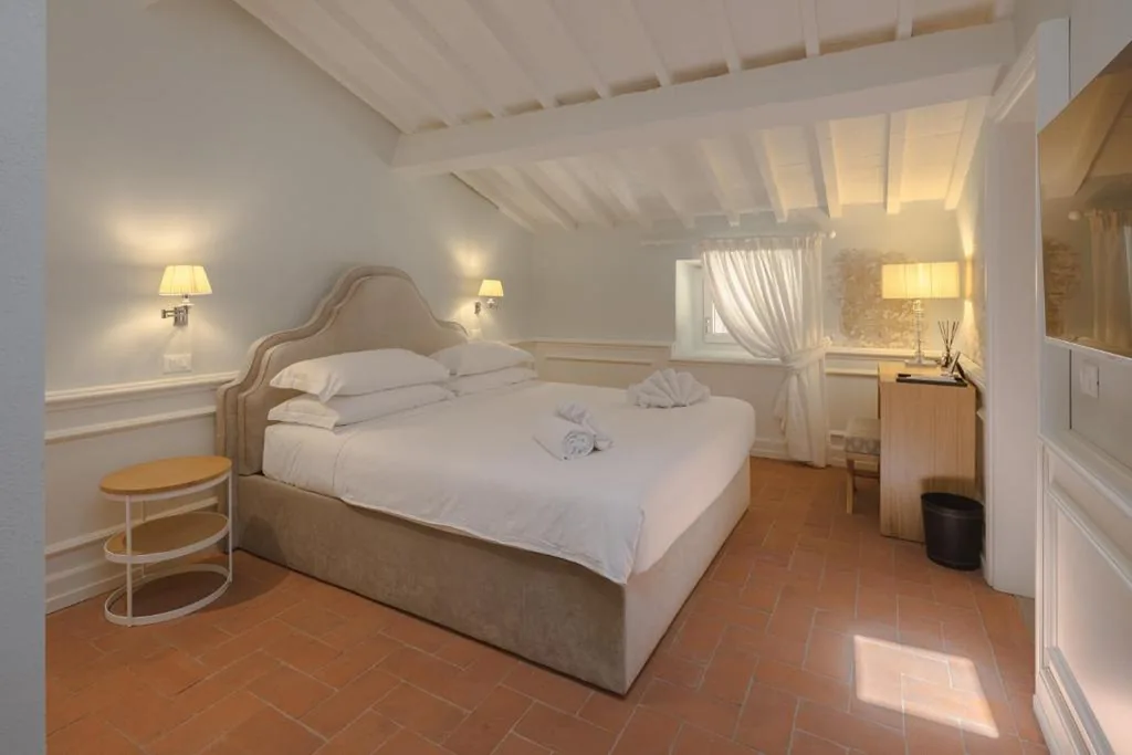 Camera Quadrupla Superior — Relais Condotta