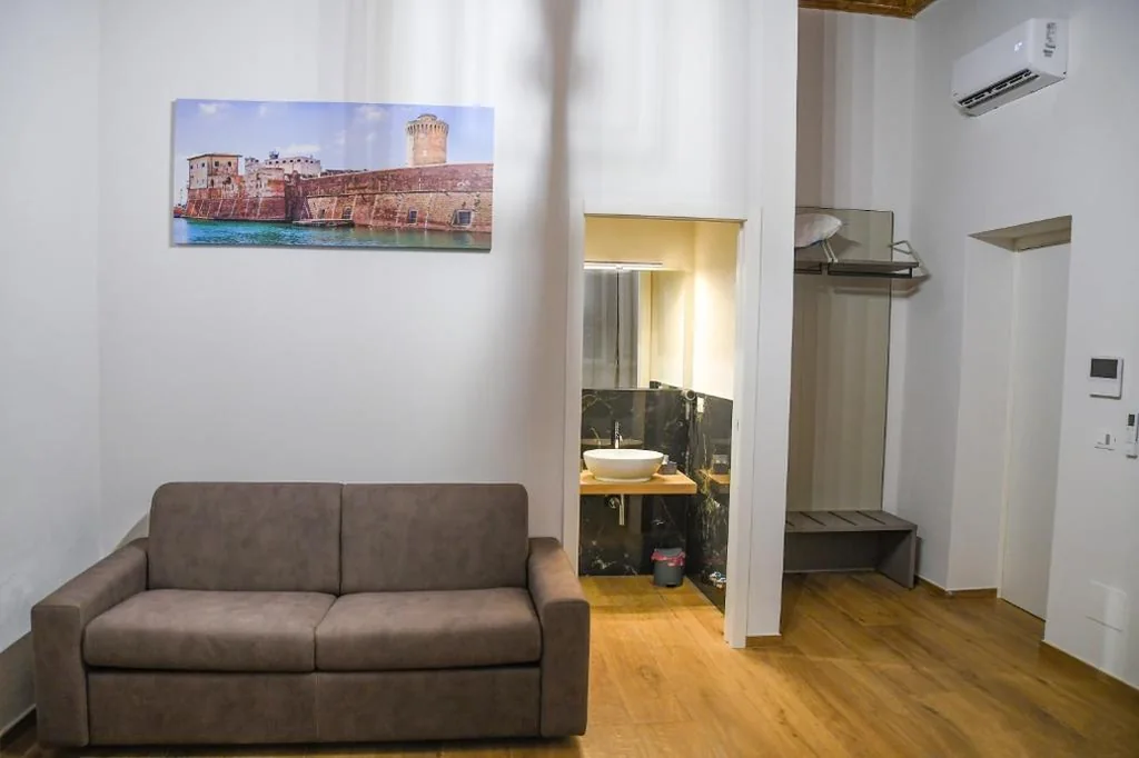 Camera Quadrupla Superior — San Giovanni Rooms Livorno
