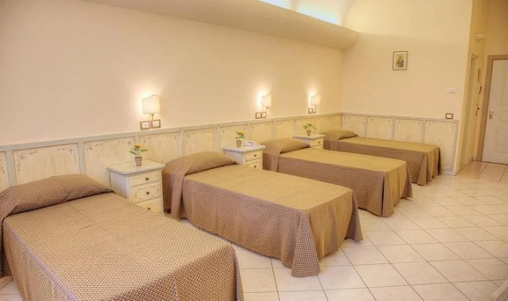 Superior Quadruple Room — Villa Santa Margherita – Albergo