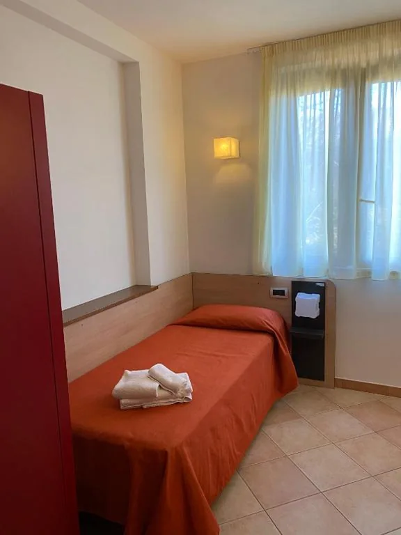 Budget Single Room — Bed & Bike