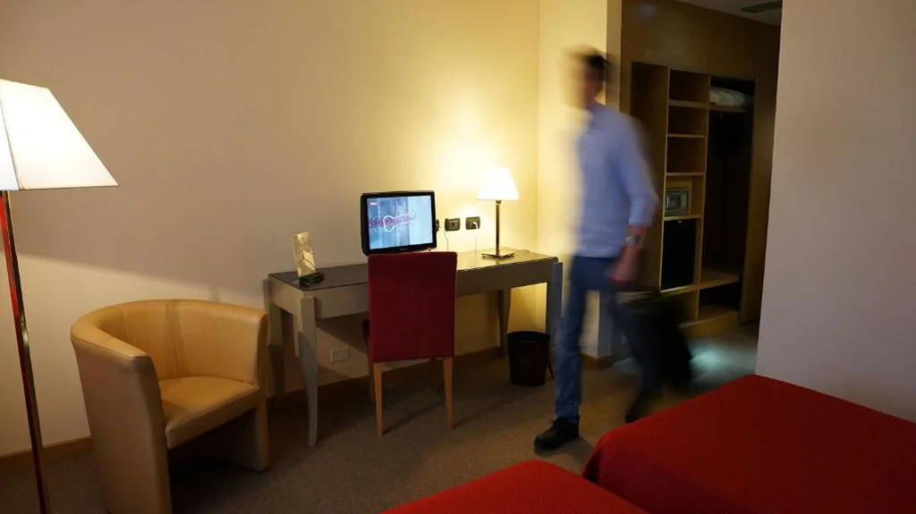 Single Room — Garden Hotel