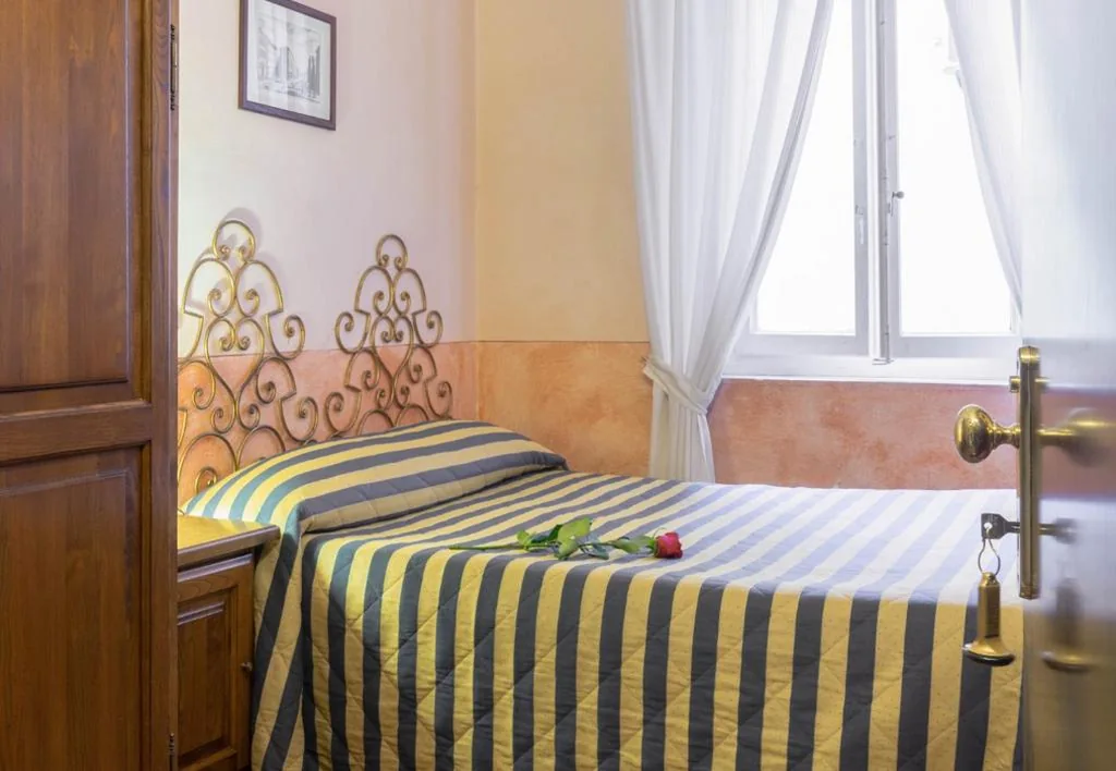 Single Room — Hotel Monica