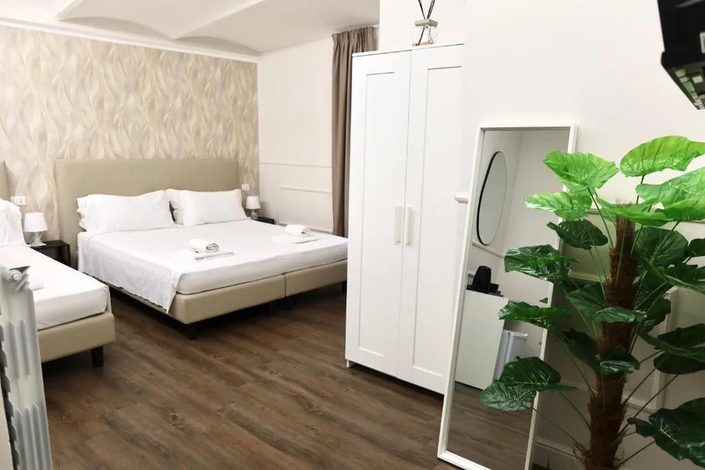 Camera Tripla — Cattaleya rooms