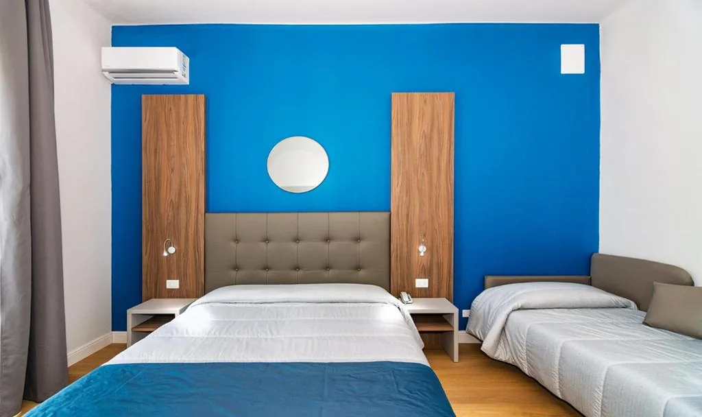 Classic Triple Room — Hotel Rialto Suisse