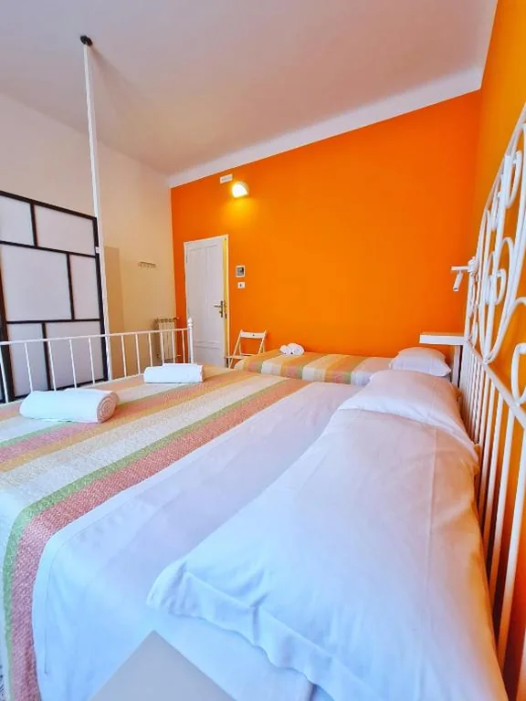 Triple Room with Shared Bathroom — “LC ROOMS Pisa” Self Check-in