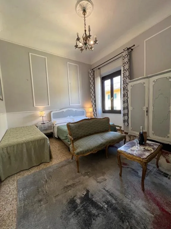 Triple Room with Shared Bathroom — Souvenir Maya