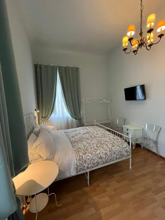 Triple Room with Private Bathroom — B&B Dante Alighieri