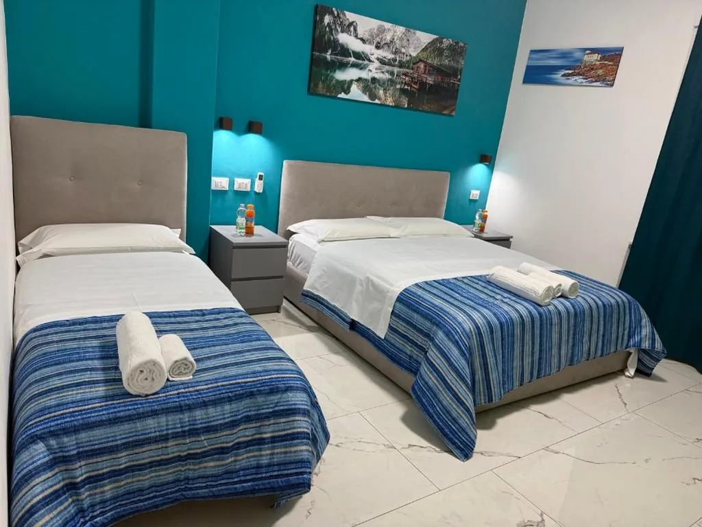 Triple Room with Private Bathroom — Luna Guest House