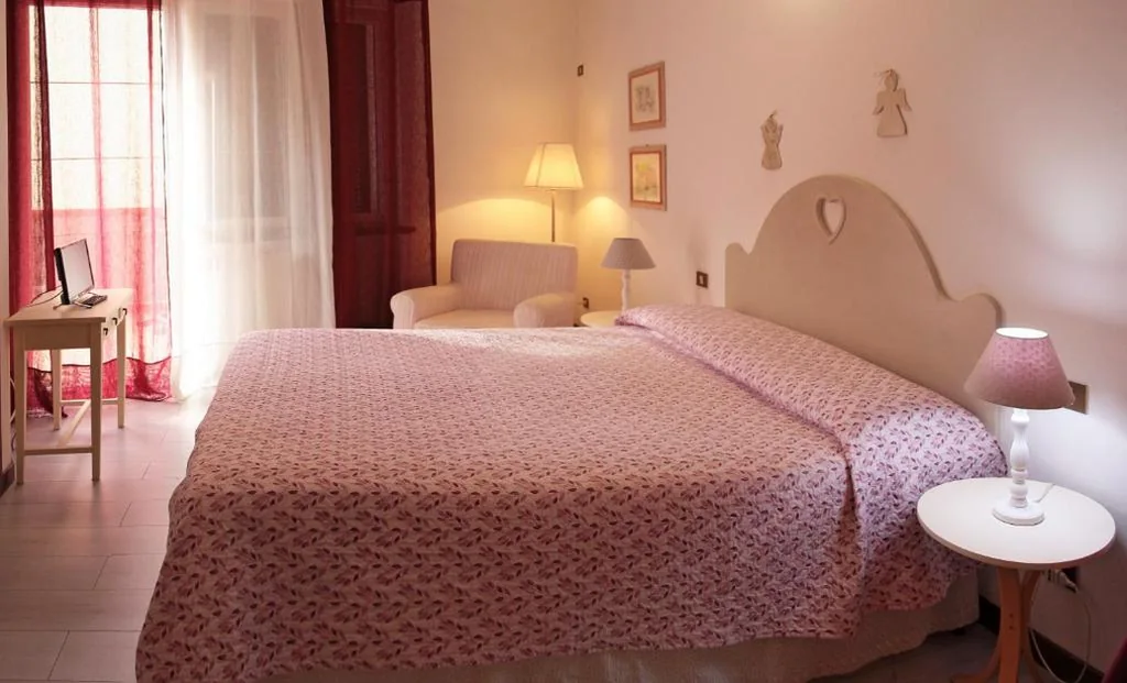 Camera Tripla con Balcone — Casa Margherita Affittacamere B&B