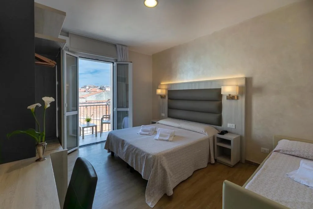 Triple Room with Balcony — Hotel Biagi & Residence