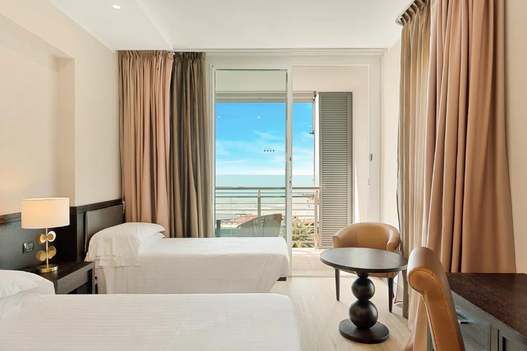 Triple Room with Balcony — Hotel Excelsior