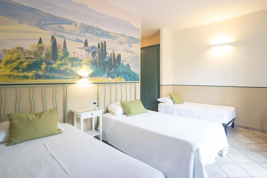 Triple Room with Balcony — Hotel Le Colline