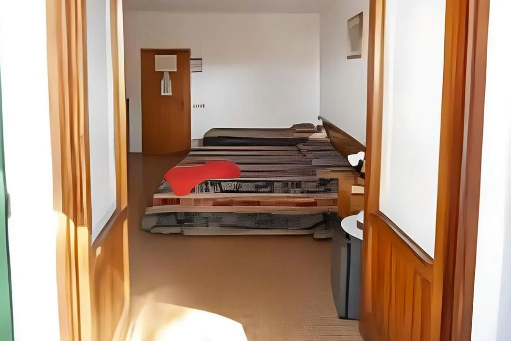 Triple Room with Balcony — Hotel Santa Caterina
