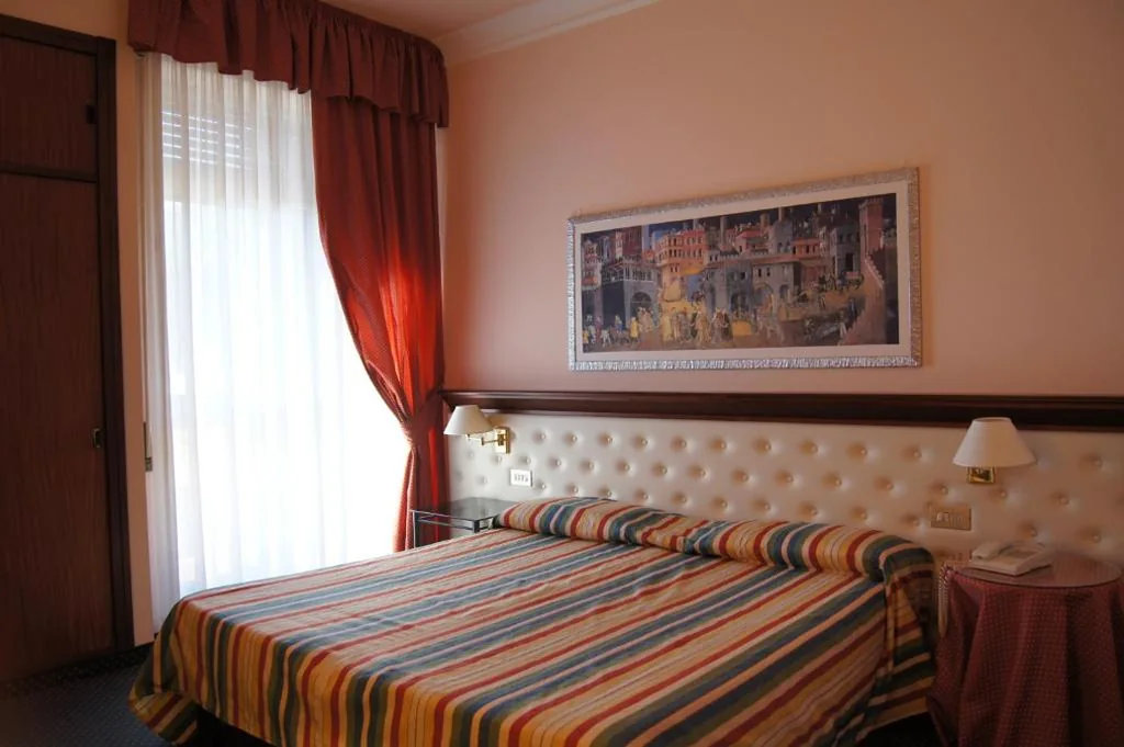 Triple Room with Balcony — Hotel Torretta